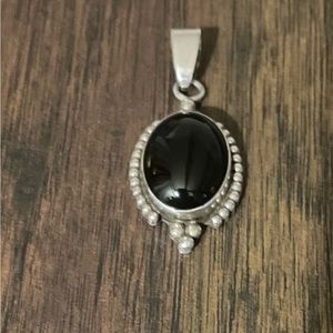 Native American Pendant by Kathleen Chavez.